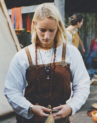 A Viking woman wearing an apron dress
